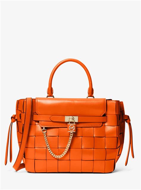 michael kors used orange satchel|Michael Kors men's satchel.